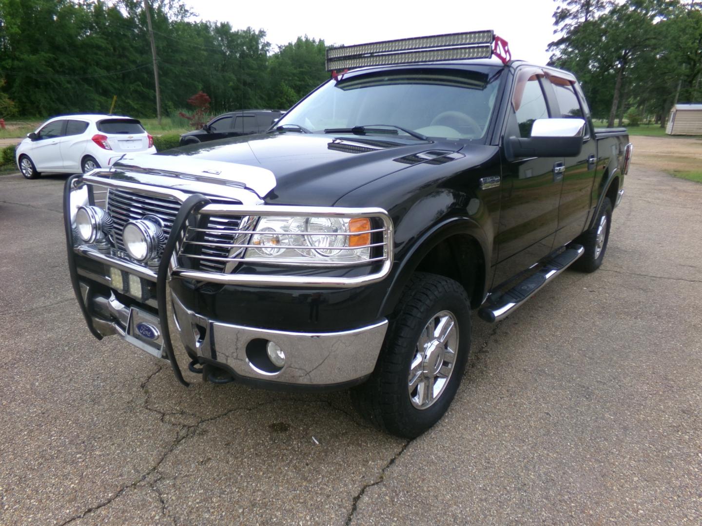 2008 Black /Tan Ford F-150 Lariat SuperCrew (1FTPW14V48K) with an 5.4L V8 SOHC 24V FFV engine, 4-Speed Automatic Overdrive transmission, located at 401 First NE, Bearden, AR, 71720, (870) 687-3414, 33.726528, -92.611519 - Photo#0